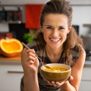 Woman eating cantaloupe